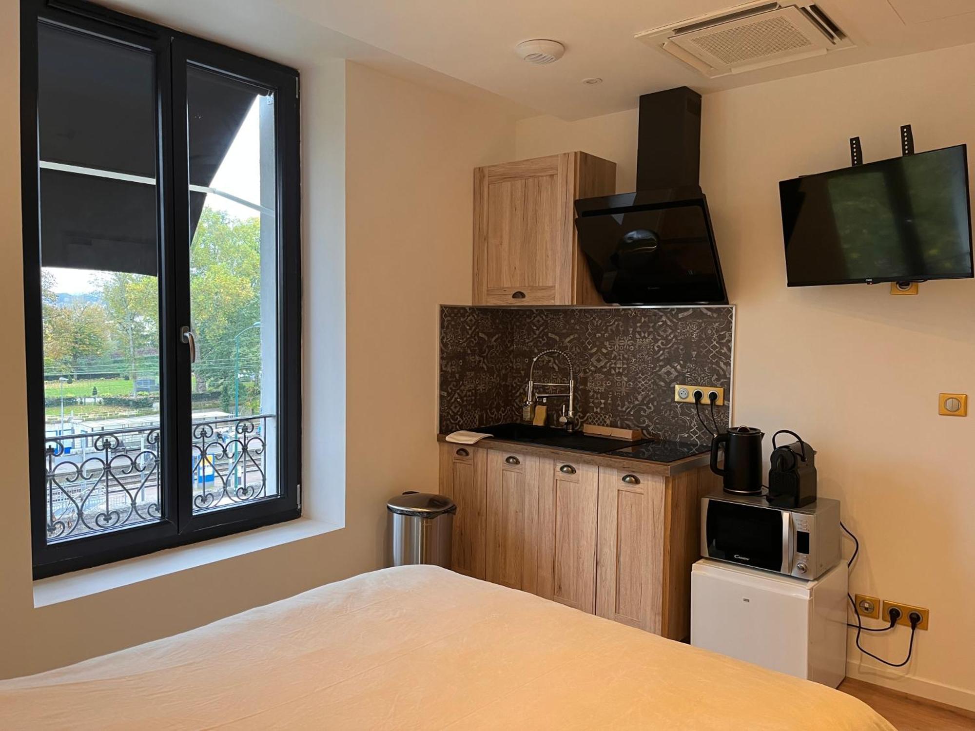 Hdg Hotel Gare De L'Isle Adam Appart'S Hotel Parmain ภายนอก รูปภาพ