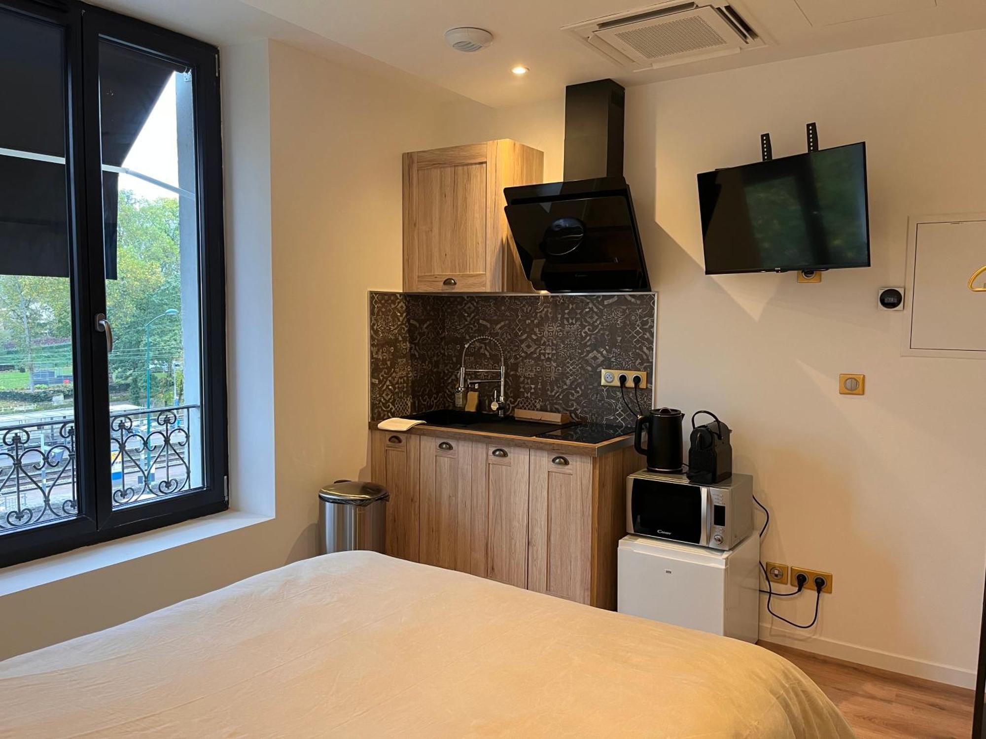Hdg Hotel Gare De L'Isle Adam Appart'S Hotel Parmain ภายนอก รูปภาพ
